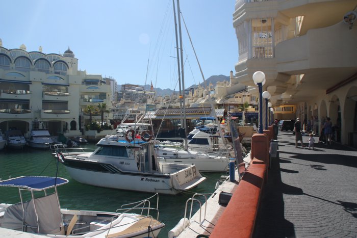 Puerto Marina Benalmádena: white ornate waterfront buildings and yachts